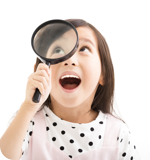 a child holding a magnifying glass